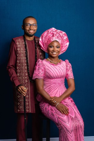 Akachi in a pink gele beside Sommie in burgundy